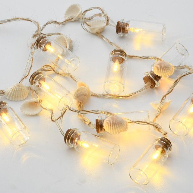 ACA Lighting "GLASS BOTTLE - SHELL", 10 LED STRING LIGHTS WITH BATTERIES (2xAA), WW, IP20, 135+30cm, TRANS/NT LEAD CABLE — F04101102